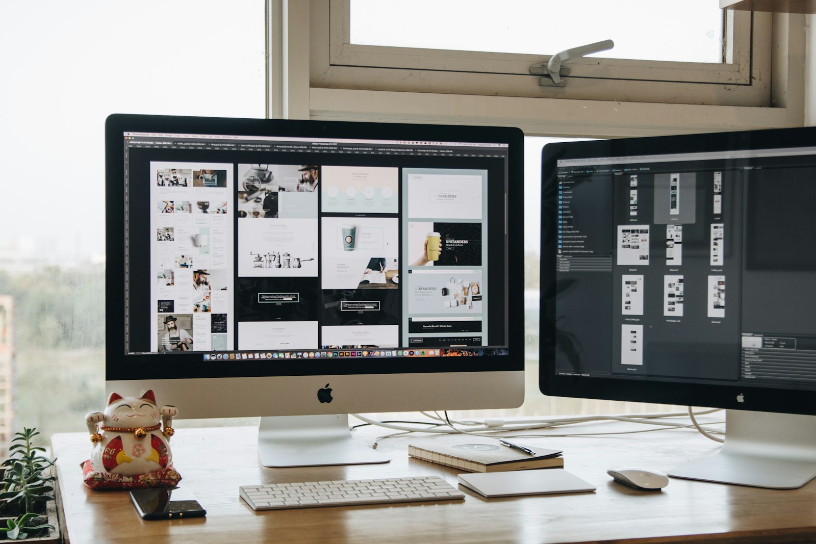 Website design screens open on a laptop